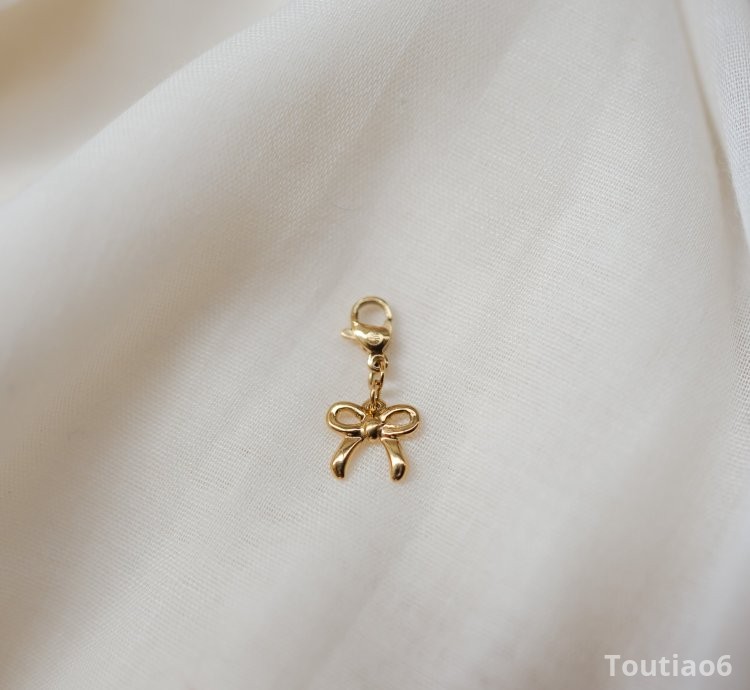 Golden Bow Pendant